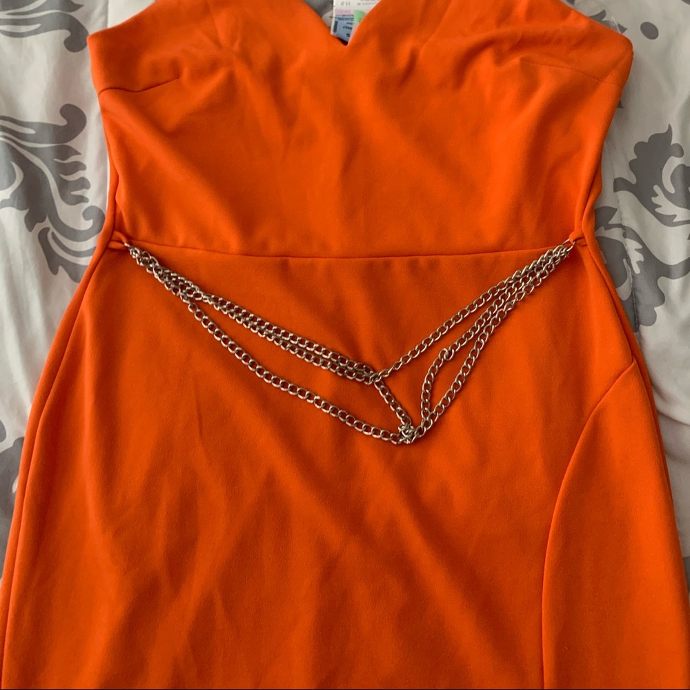 Body con dress with belt chain